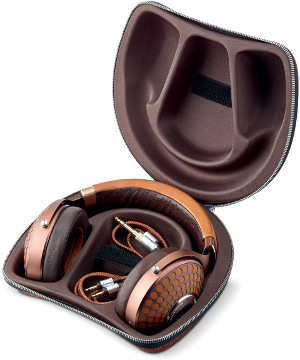 Focal Stellia Closed-Back Headphone shown here in its rigid travel case in cognac and mocha woven finishes.