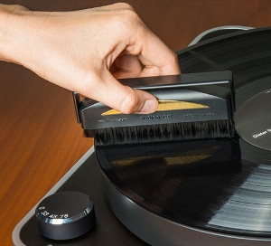 audioquest Conductive, Anti-Static Record Brush. Shown here cleaning a record on a Clearaudio Concept turntable. 