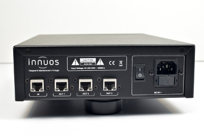 Innuos PhoenixNET - rear panel showing 1 Ethernet RJ45 in and 3 Ethernet RJ45 Out. 