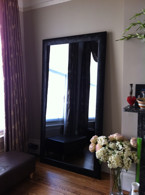 Neod Full Length Mirror TV - lent against wall