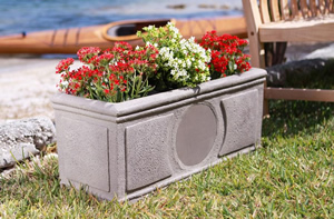 Niles PB6SI Weatherproof Stereo Planter Box Loudspeaker filled with plants - Weathered Concrete